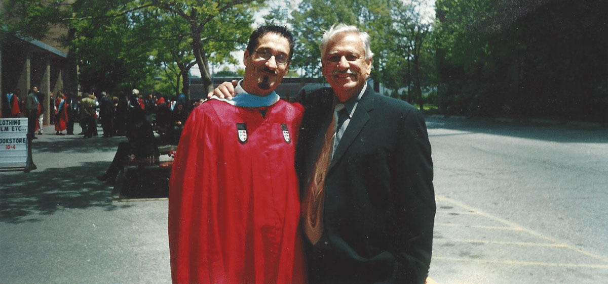 A photo of Albert Rizzi with his father, Umberto “Al” Rizzi, at Albert’s graduation from St. John’s University.